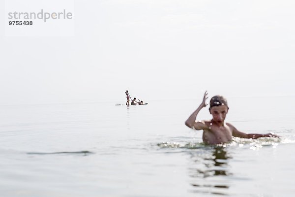 Teenagers bathing