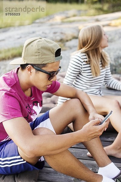 Handy Jugendlicher Junge - Person jung