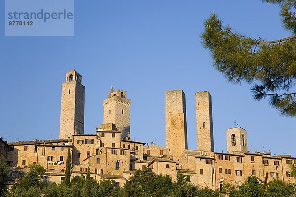 beleuchtet Mittelalter Europa aufwärts UNESCO-Welterbe Italien San Gimignano Siena Sonne Toskana