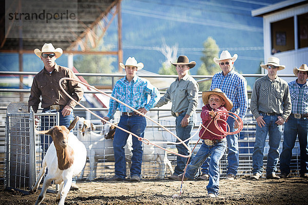 Ziege Capra aegagrus hircus unterrichten Junge - Person Cowboy Lasso Rodeo