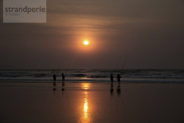 Angler bei Sonnenaufgang  Chintsa  Südafrika