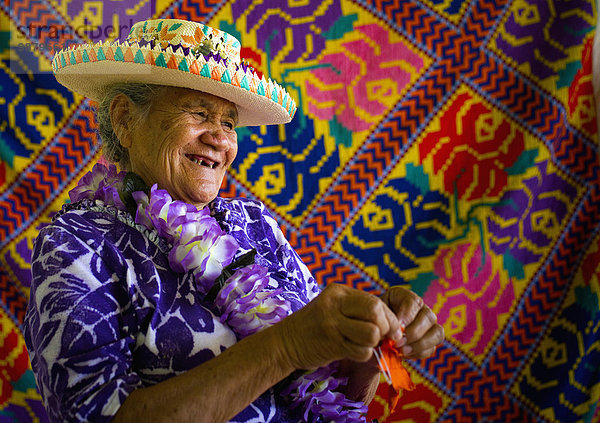 'A woman weaving; Aitu Island  Cook Islands'