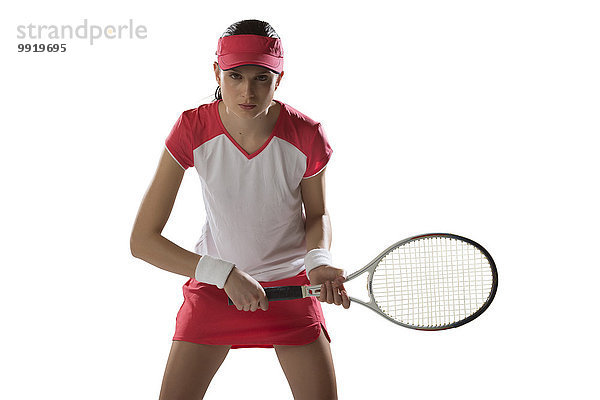 Studioaufnahme junge Frau junge Frauen Portrait spielen Tennis