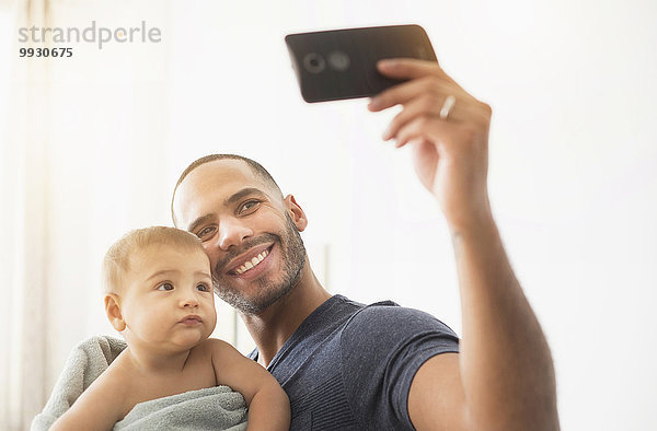 Handy Fotografie nehmen Menschlicher Vater Sohn Baby