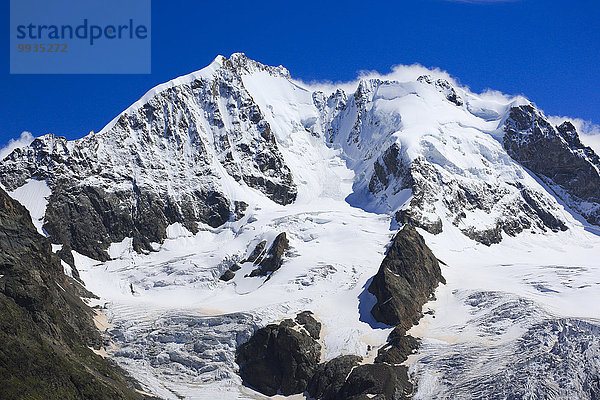 Felsbrocken Berg Berggipfel Gipfel Spitze Spitzen Stein Sommer Himmel Steilküste Alpen Ansicht Kanton Graubünden Westalpen Engadin Oberengadin Piz Bernina schweizerisch Schweiz Schweizer Alpen
