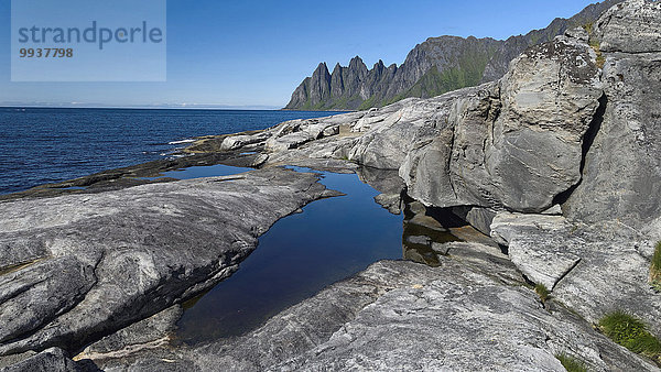Felsbrocken Landschaftlich schön landschaftlich reizvoll Europa Berg Himmel Landschaft Steilküste Küste Meer Natur Pfütze Norwegen blau Bucht Fjord Granit Nordsee Skandinavien