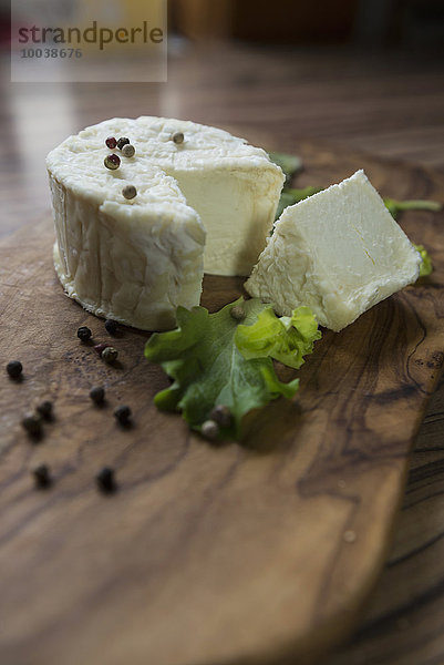 Close-up of cheese and lettuce leaf  Germany