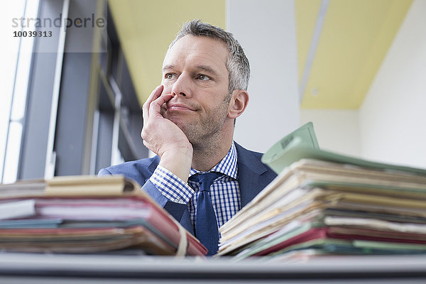 Businessman working in office  Leipzig  Saxony  Germany