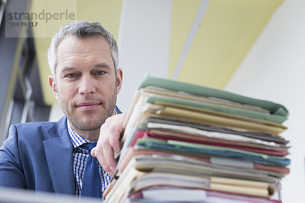 Businessman working in office  Leipzig  Saxony  Germany