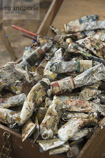 Rubbish paint tubes in wooden box  Bavaria  Germany