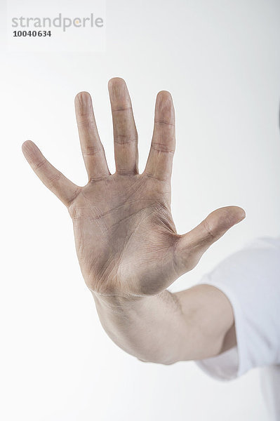 Close-up of man's hand making stop gesture  Bavaria  Germany