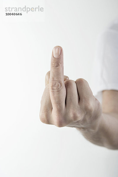 Close-Up Of a man's hand showing obscene gesture  Bavaria  Germany