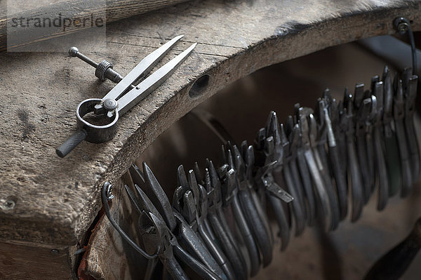 Various pliers hanging in workshop  Bavaria  Germany