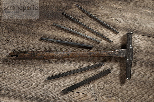 Close-up of punches with hammer in workshop  Bavaria  Germany