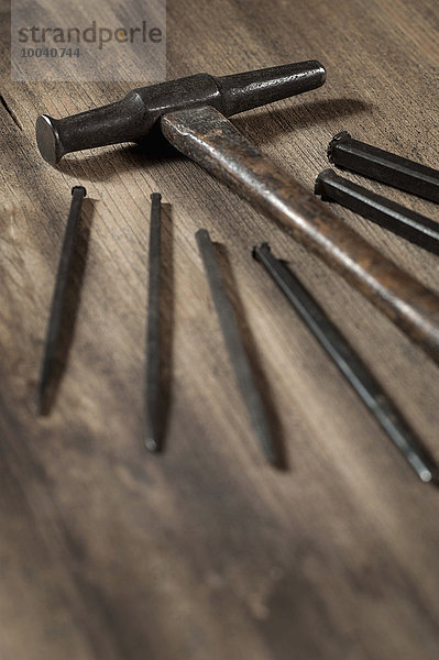 Close-up of punches with hammer in workshop  Bavaria  Germany