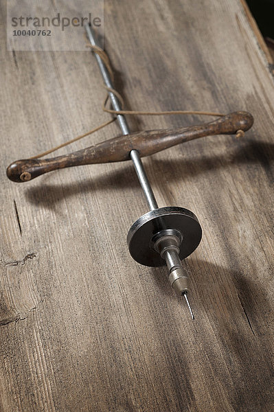 Close-up of drill on table in workshop  Bavaria  Germany