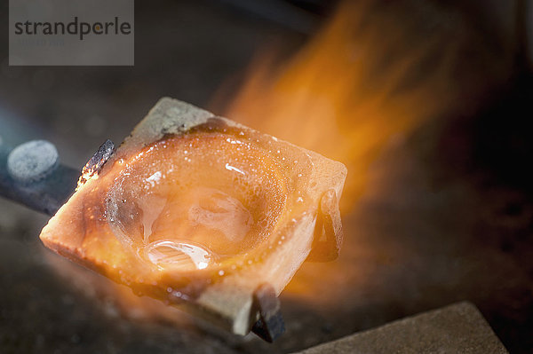 Melting copper in a jewelry shop  Bavaria  Germany