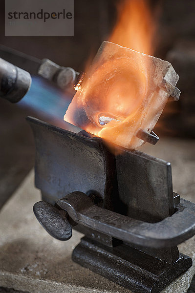 Melting copper in a jewelry shop  Bavaria  Germany