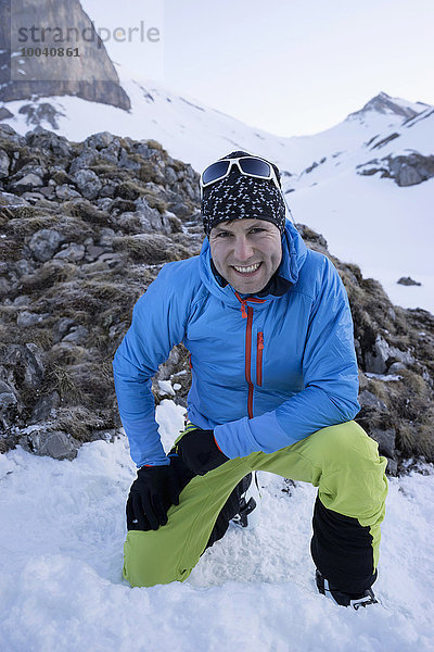 Portrait of male skier on snow covered mountain  Tyrol  Austria