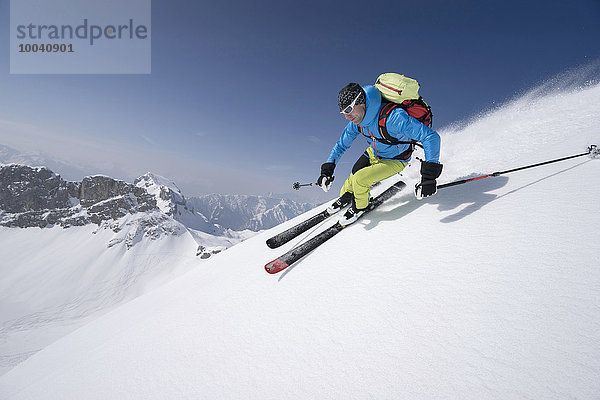 Young man skiing  Rofan  Tyrol  Austria