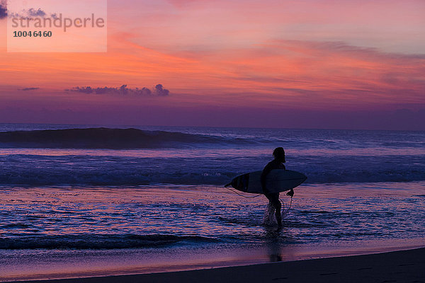 Indonesia  Bali  Surfer at sunset