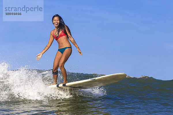 Indonesia  Bali  woman surfing