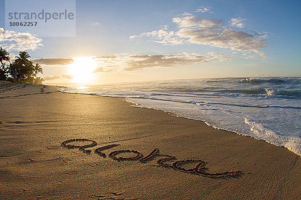 Aloha  geschrieben im Sand am Strand  Hawaii