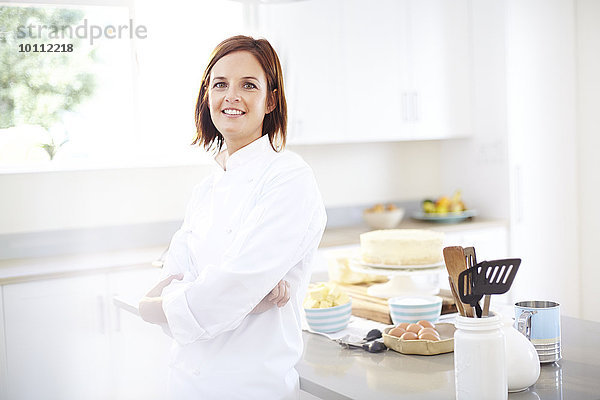 Portrait selbstbewusster Koch in der Küche