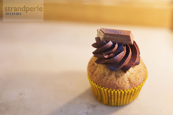 Cupcake mit Schokoladenglasur