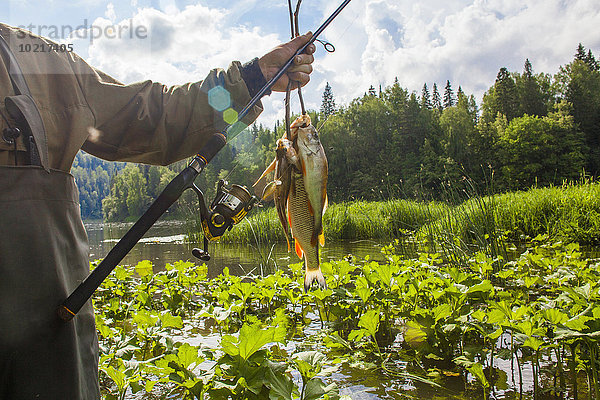 Ländliches Motiv ländliche Motive Fisch Pisces fangen halten Fluss Fischer