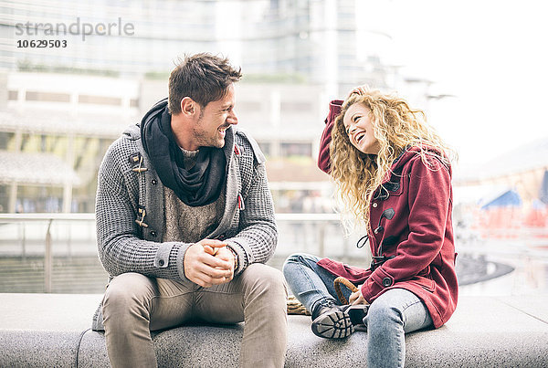 Italy  Milan  couple laughing together