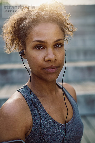 Portrait of woman wearing headphones