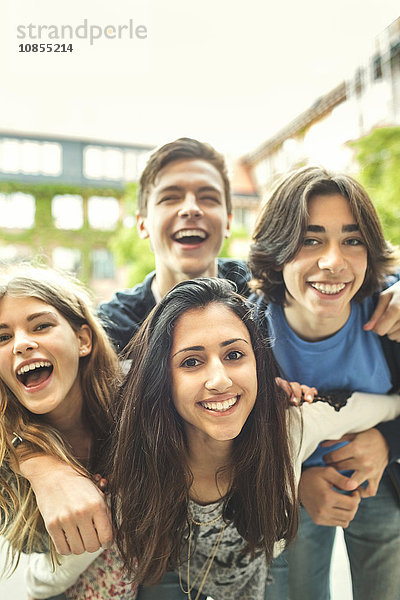 Portrait of happy teenagers enjoying outdoors