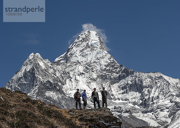 Nepal  Himalaya  Solo Khumbu  Ama Dablam  four Gurkhas in mountainscape
