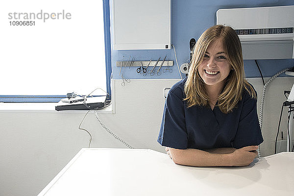 Portrait of smiling veterinary surgeon in a veterinary practice