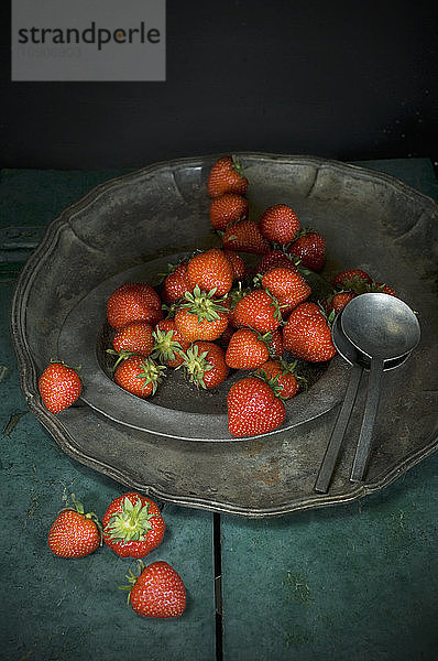 Strawberries on tin plates