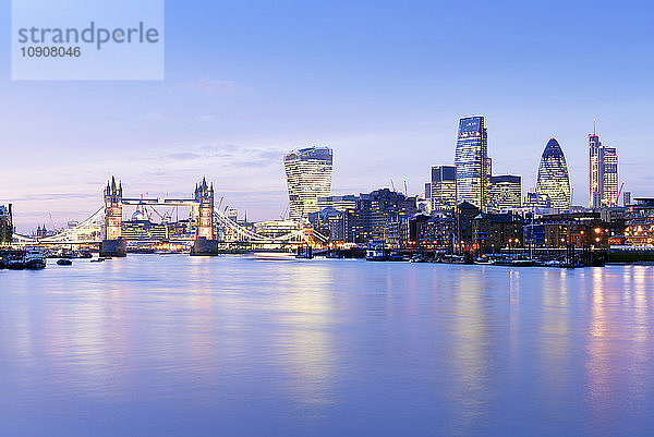 UK  London  skyline with River Thames and Tower Bridge at blue hour