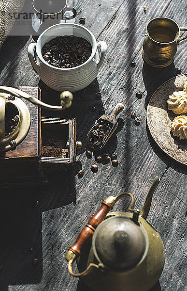 Grinding coffee with vintage coffee mill
