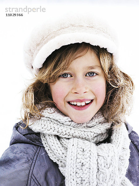 Ein Junge in Winterkleidung  Porträt.