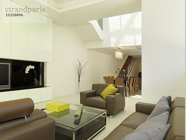 Modernes Wohnzimmer mit lindgrünen Akzenten
