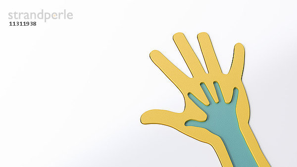 Gelbe Hand und integrierte blaue Hand