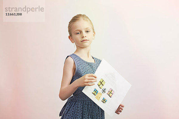 Porträt eines Mädchens mit Hauszeichnung
