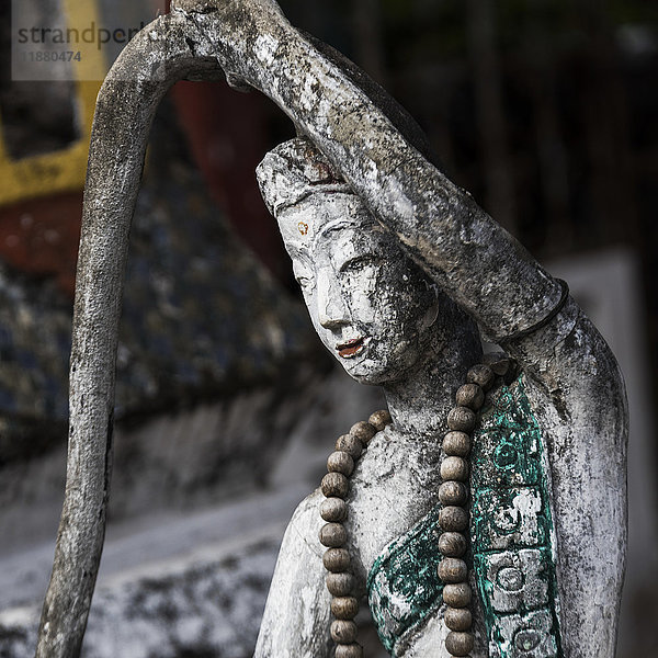 Abgenutzte und verwitterte buddhistische Skulptur; Luang Prabang  Provinz Luang Prabang  Laos'.