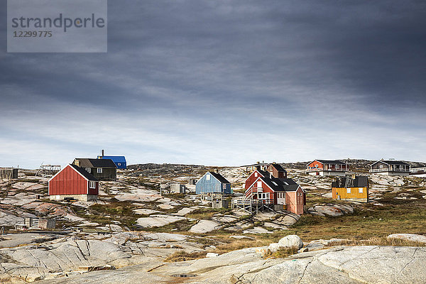 Craggy  remote  vibrant fishing village  Kalaallisut  Greenland