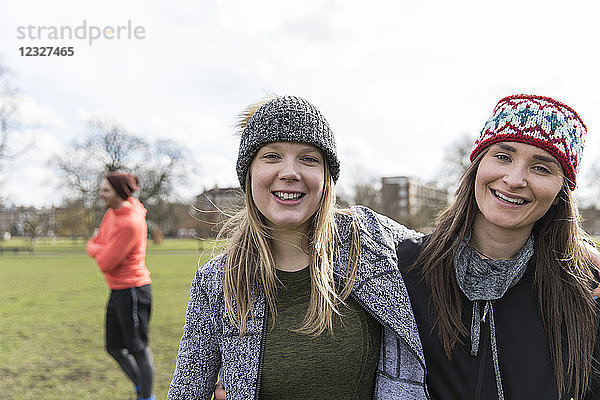 Portrait smiling  confident women in park