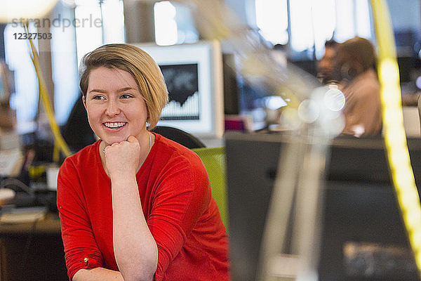 Smiling businesswoman in office