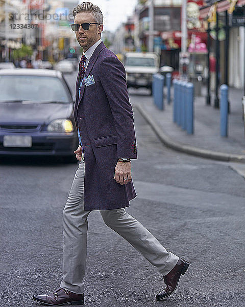 Portrait of fashion blogger Steve Tilbrook walking in the city