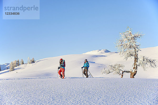Austria  Tyrol  couple snowshoeing