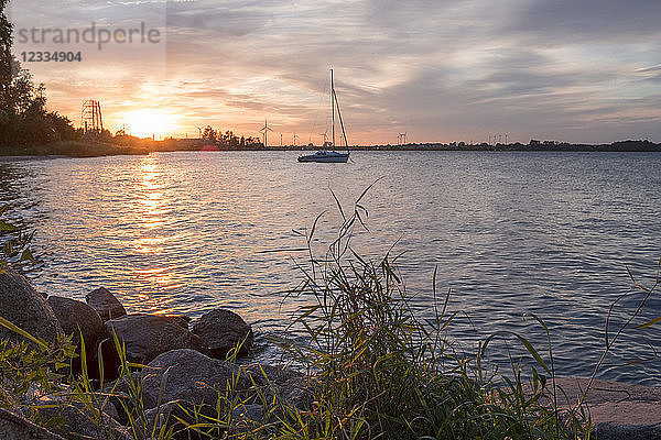 Poland  Gdansk Bay  view to wind park at sunset