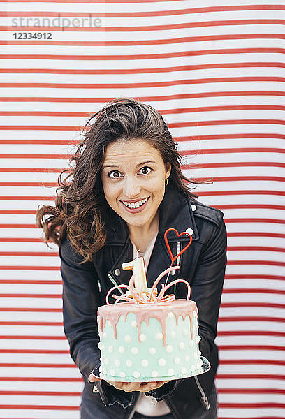 Portrait of woman with Birthday cake